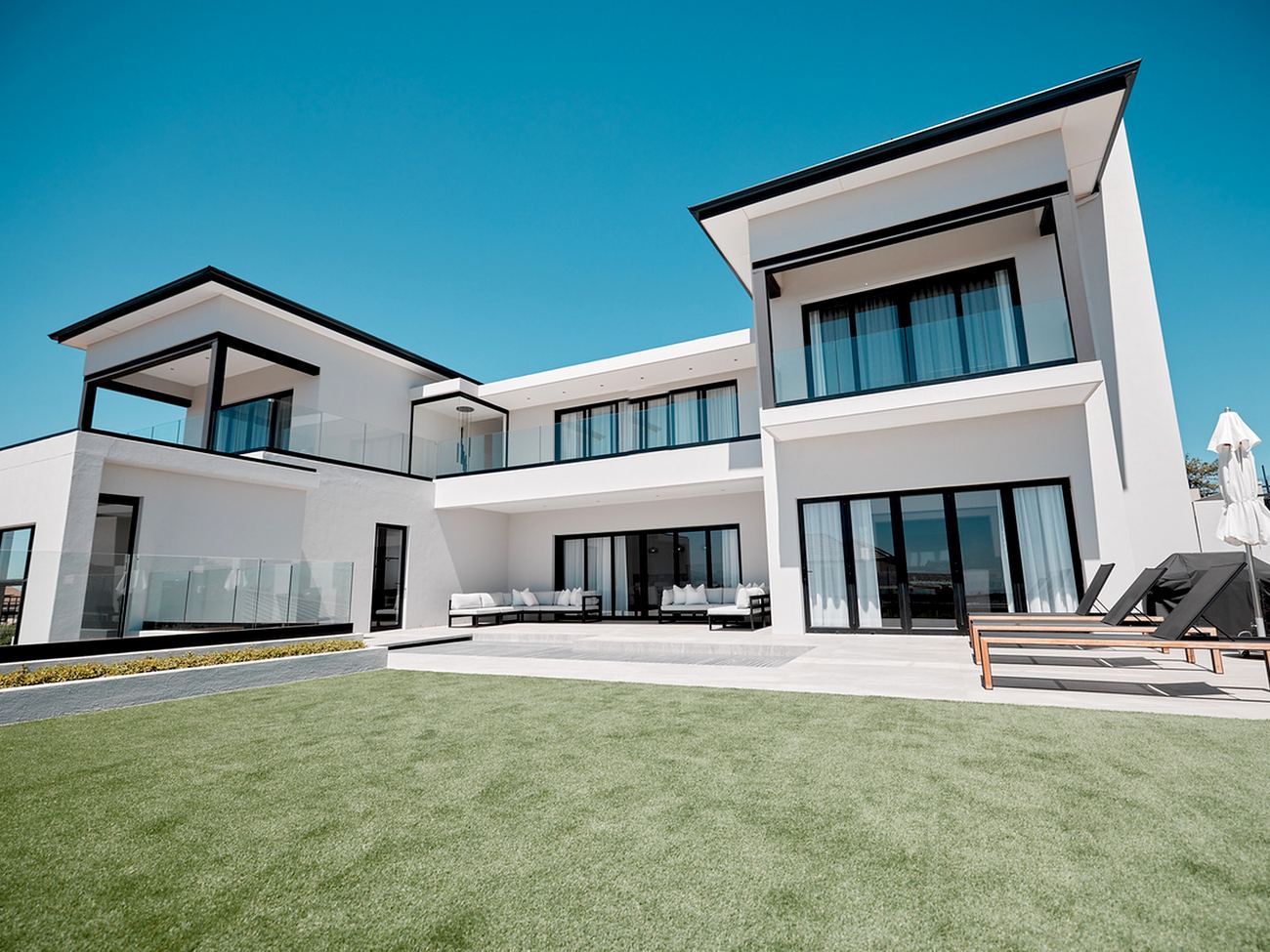 Contemporary white villa with garden terrace