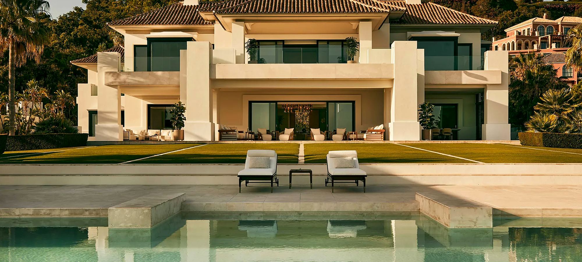 Mediterranean estate with a reflecting pool